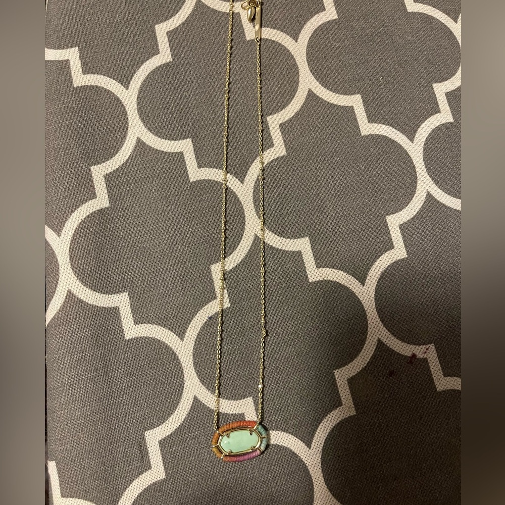 Kendra Scott necklace.